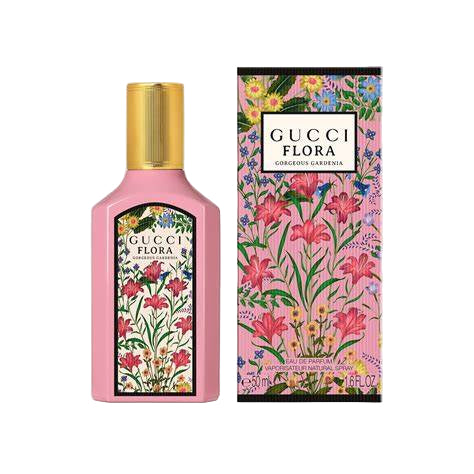 A pink bottle of GUCCI FLORA GORGEOUS GARDENIA WOMEN perfume with a gold cap is shown next to its floral-patterned box, both featuring the GUCCI brand and fragrance name.