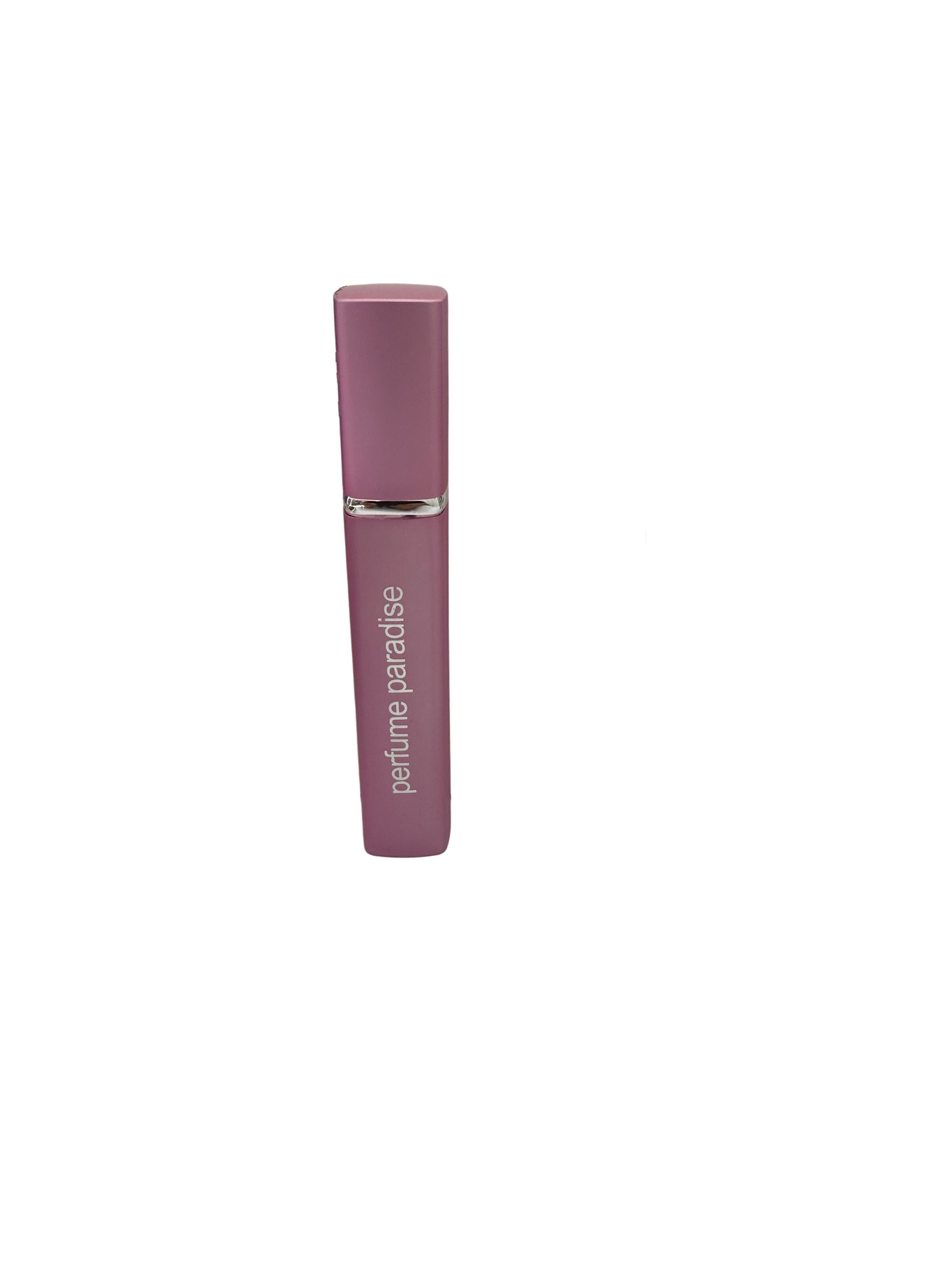 Pink perfume bottle with 'Perfume Paradise' packaging on a white surface.