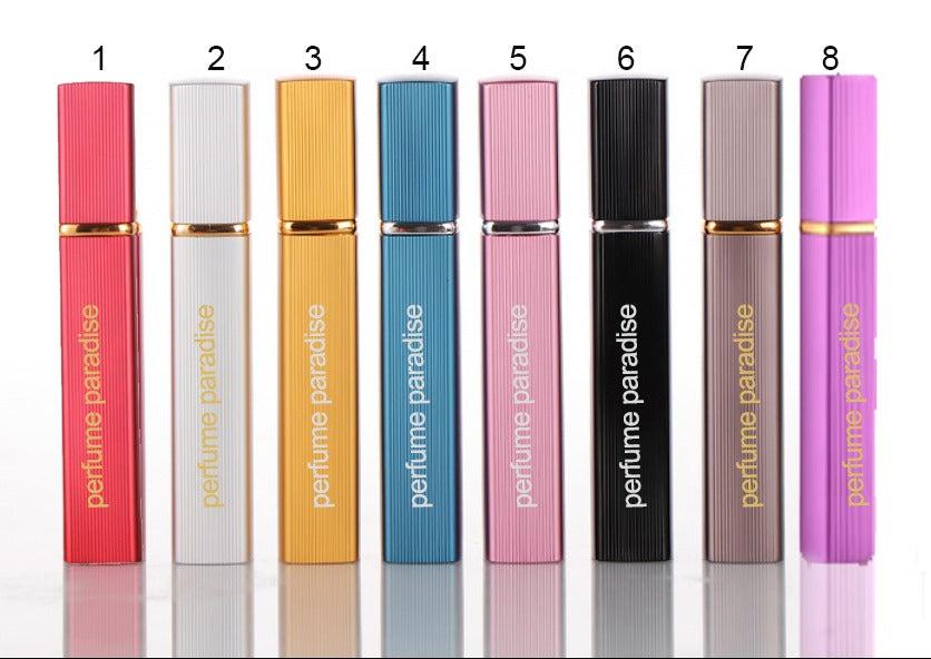 Eight slim 10ml Perfume Automizer bottles by Self stand in a row, each a different color—red, white, yellow, gold, pink, light pink, black, taupe—numbered 1 to 8.