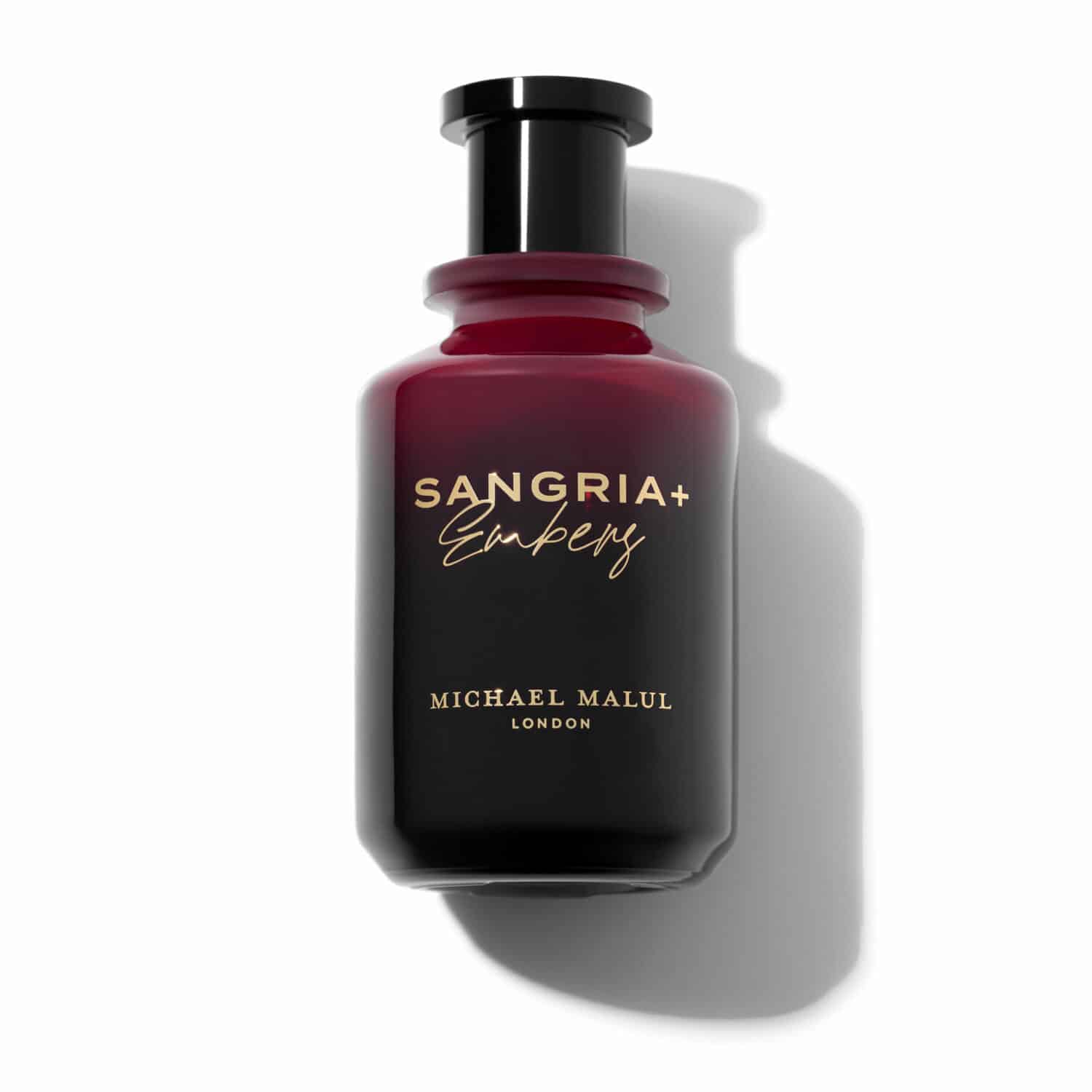 Perfume bottle labeled 'Sangria+ Ember' by Michael Malul London on a white background
