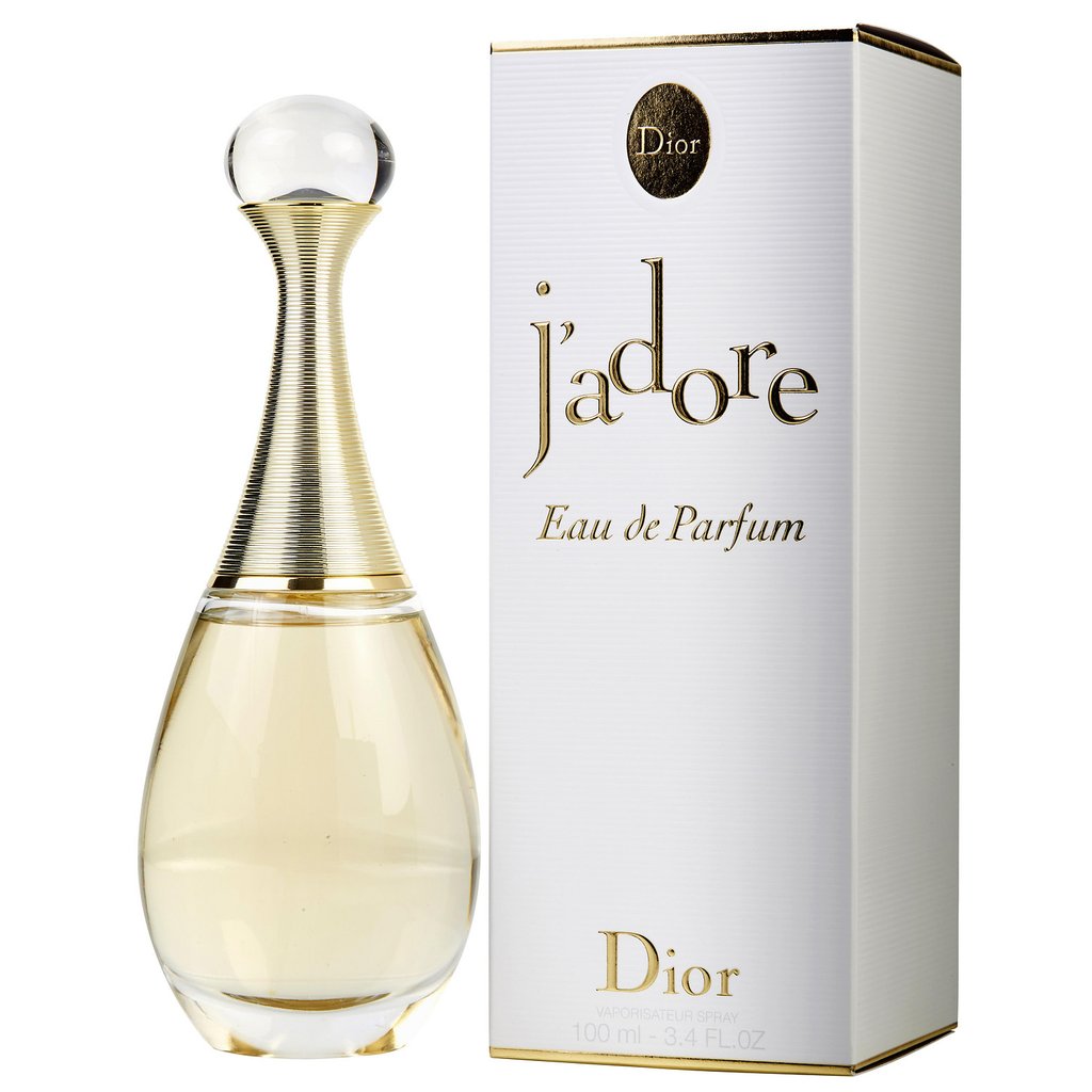 A bottle of DIOR JADORE EDP WOMEN by DIOR stands beside its white and gold box with elegant gold accents and text, both set against a plain white background.
