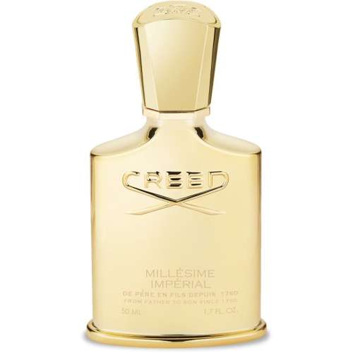 Gold Creed perfume bottle on a white background